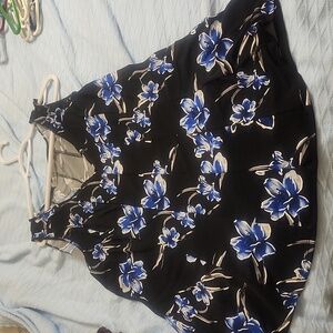 Blue flower and black sleeveless blouse
